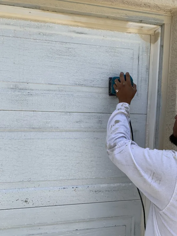Stripping garage door to aluminum