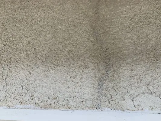 After caulking stucco with elastomeric caulking - flexible, won't shrink
